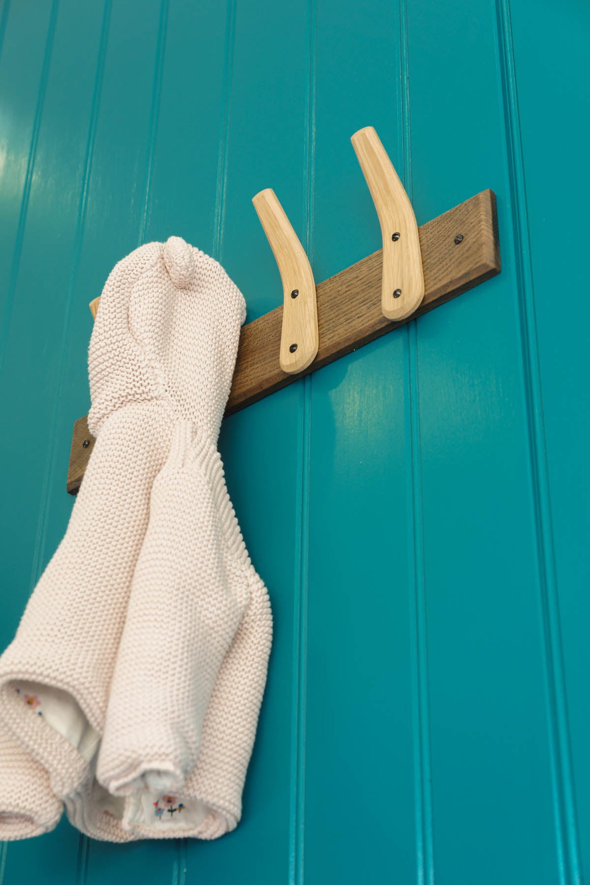 Wall mounted coat hooks. LayerTree.