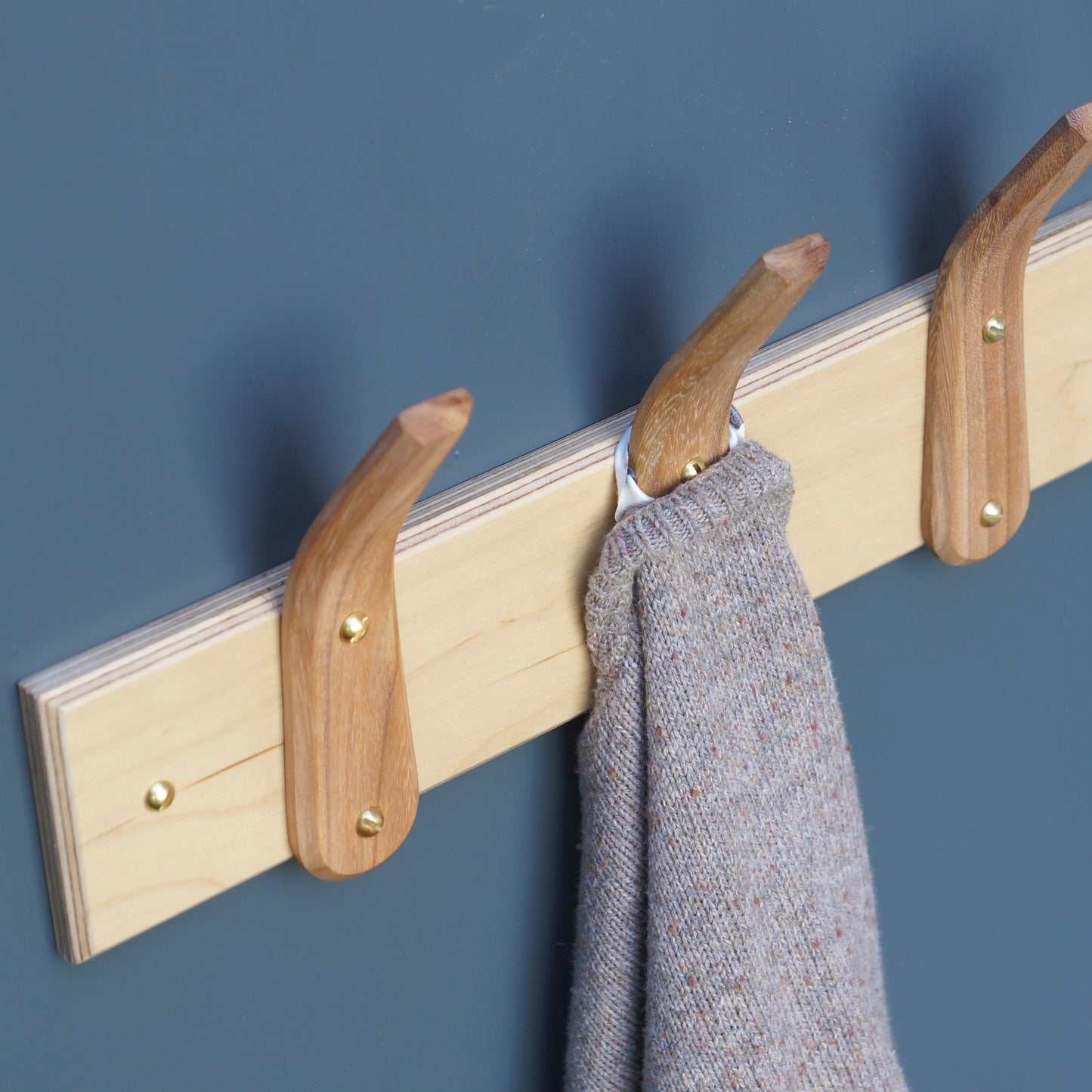 Peg rail coat rack. LayerTree.